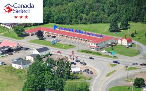 an aerial view of a small town with a building at Coastal Inn Antigonish in Antigonish