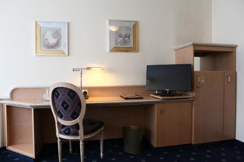 Et tv og/eller underholdning på Hotel Ambiente Garni