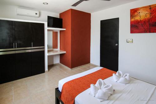 Postel nebo postele na pokoji v ubytování Gayser Apartamentos