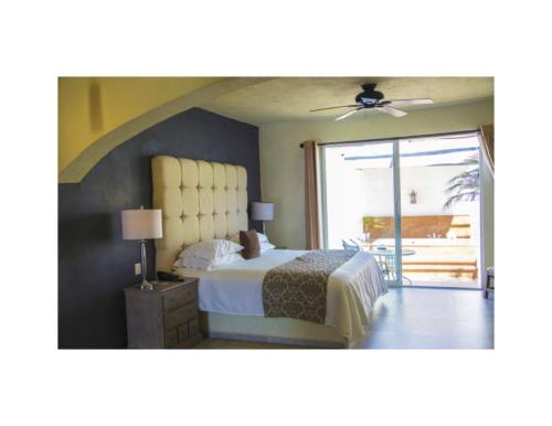 Una cama o camas en una habitación de Hotel Spa Sitio Sagrado