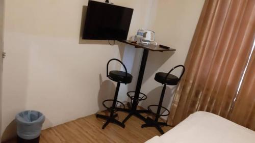 TV a/nebo společenská místnost v ubytování My Family Hotel