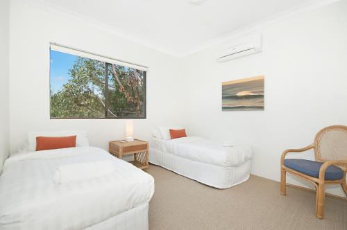 A bed or beds in a room at Byron Bay Accom Koranba on Lawson