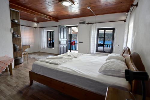 En eller flere senge i et værelse på Ankh Pension