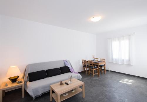 Ένα ή περισσότερα κρεβάτια σε δωμάτιο στο A&A House Mykonos A
