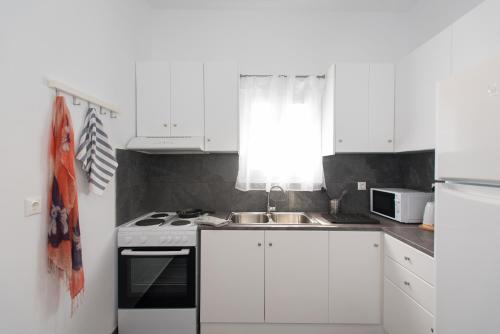Η κουζίνα ή μικρή κουζίνα στο A&A House Mykonos A