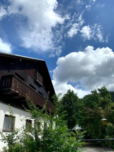 a building with a balcony on the side of it at Piano Annaberg Apartments in Annaberg