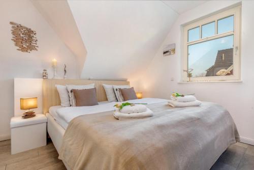 Postel nebo postele na pokoji v ubytování Villa Boddenluft