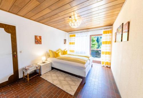 Postel nebo postele na pokoji v ubytování Haus Schauinsland