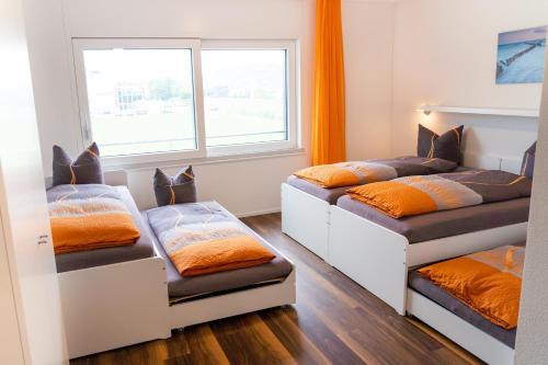 Postel nebo postele na pokoji v ubytování Anstatthotel Schafisheim - self-check-in