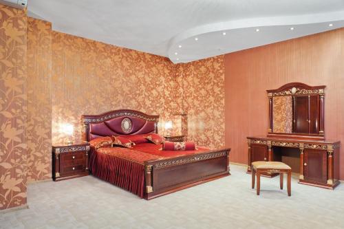 Postel nebo postele na pokoji v ubytování Voronezh Hotel