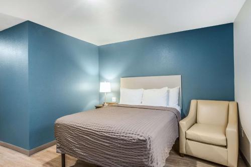 Letto o letti in una camera di WoodSpring Suites Atlanta McDonough