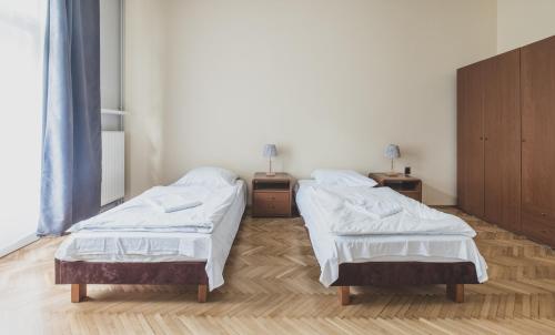 Cybulskiego Guest Roomsにあるベッド