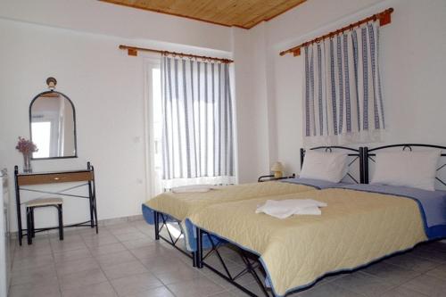 Apollon Roomsにあるベッド