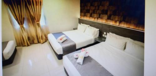 Ένα ή περισσότερα κρεβάτια σε δωμάτιο στο IM 96 Villa