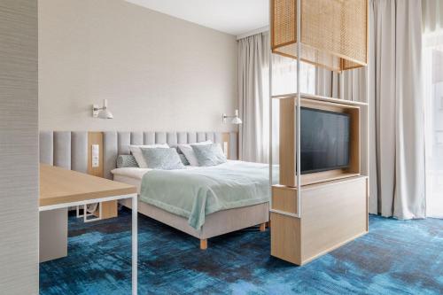 Postel nebo postele na pokoji v ubytování Hotel Morski Widok