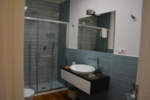 a bathroom with a sink and a shower at Le Veneri Del Golfo in La Spezia