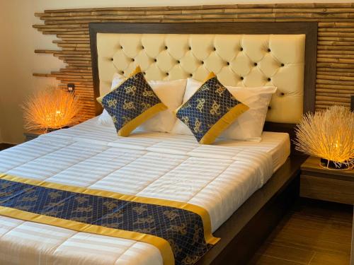 Кровать или кровати в номере Gia An Hung Guest House