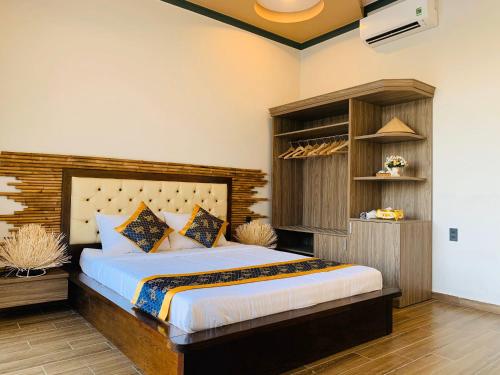 Ένα ή περισσότερα κρεβάτια σε δωμάτιο στο Gia An Hung Guest House