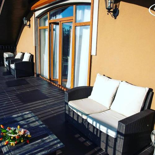 Χώρος καθιστικού στο Hotel Magnat