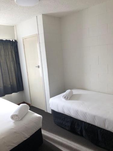 Katil atau katil-katil dalam bilik di Victoria Apartments