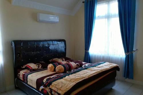 Katil atau katil-katil dalam bilik di Villa Nils