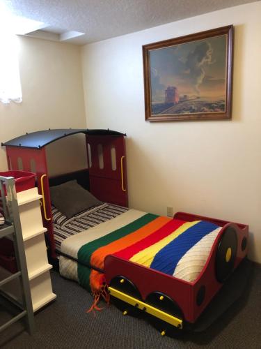 a childs bedroom with a bed with a truck bed at Near the pier in Astoria, Oregon