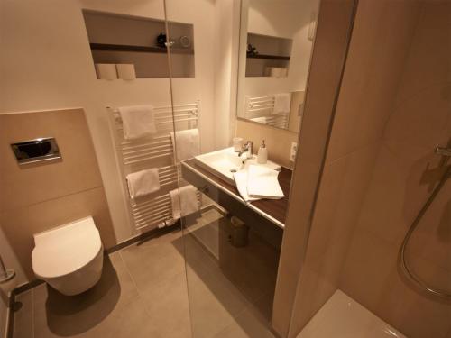 Kylpyhuone majoituspaikassa Boardinghouse Bielefeld