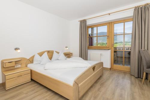 Katil atau katil-katil dalam bilik di Hotel Linger