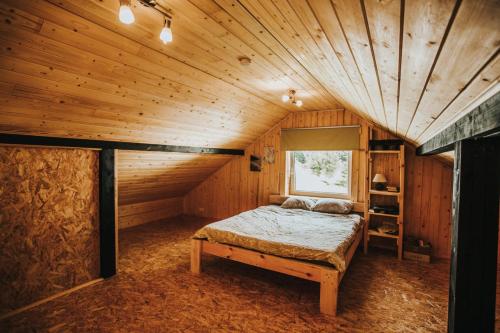 A bed or beds in a room at Nītaigā Holiday Home