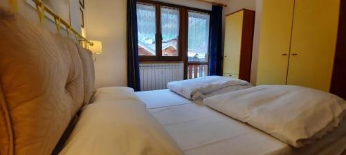 Postel nebo postele na pokoji v ubytování Residence Weissthor