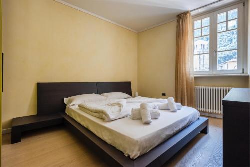 Posteľ alebo postele v izbe v ubytovaní Attico la Rocca