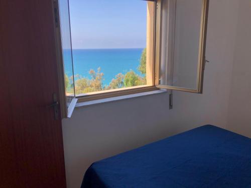 Postel nebo postele na pokoji v ubytování Apartment Marechiaro Agrigento