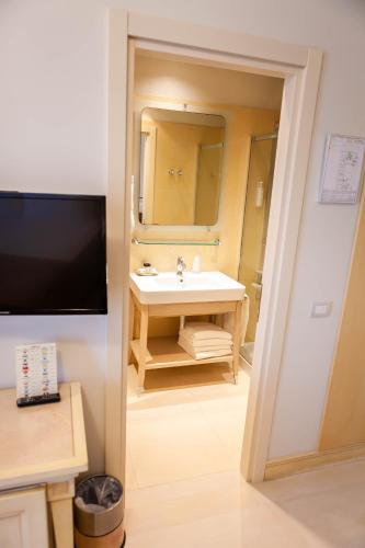 Um banheiro em Hotel Conchiglia