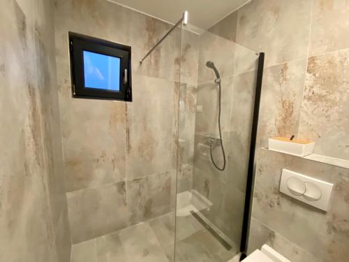 Et badeværelse på Luxury BEACH VILLA VIR / apartments