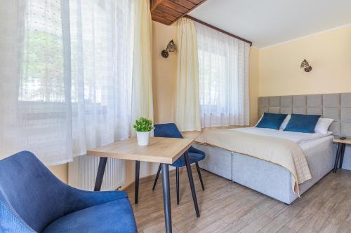 Postel nebo postele na pokoji v ubytování Mewa