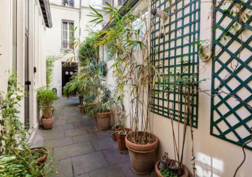Atelier d'Artiste Marais Paris, 3 chambres, cour privée calme