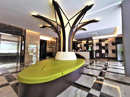 Zona de estar de Prestigo Hotel - Johor Bharu