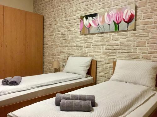 Ένα ή περισσότερα κρεβάτια σε δωμάτιο στο Snow Apartment - Bansko