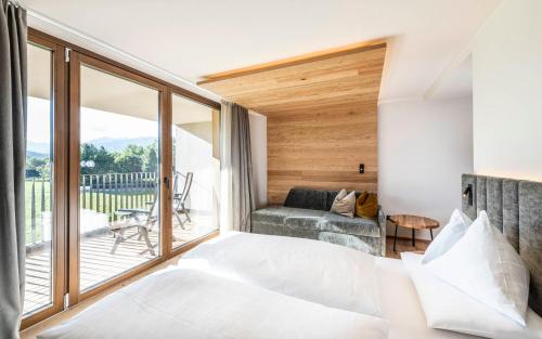 Postel nebo postele na pokoji v ubytování Hotel Olympia