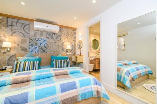 Кровать или кровати в номере Luxurious Villa MALOMAR