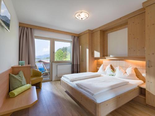 Katil atau katil-katil dalam bilik di Aparthotel Brandauerhof