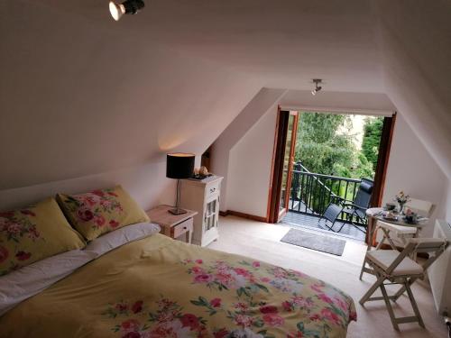 Katil atau katil-katil dalam bilik di Canterra Cottage