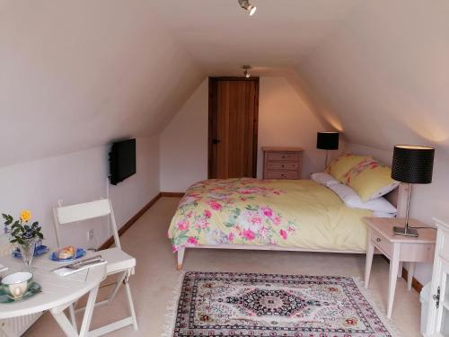 Postel nebo postele na pokoji v ubytování Canterra Cottage