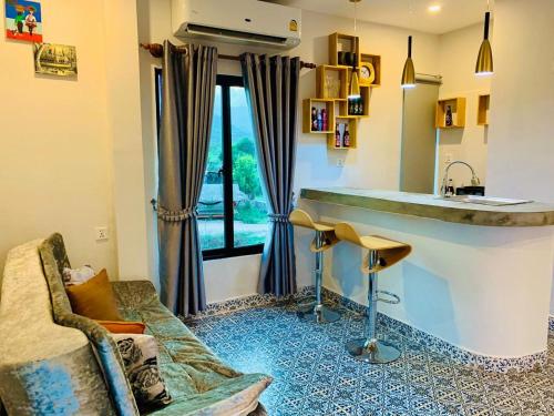 Ruang duduk di Raing Phnom Bungalow