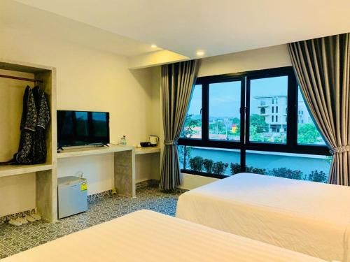 Televisyen dan/atau pusat hiburan di Raing Phnom Bungalow
