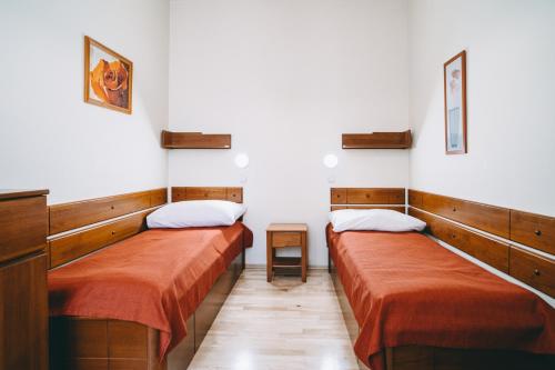 Postel nebo postele na pokoji v ubytování Hotel Dar