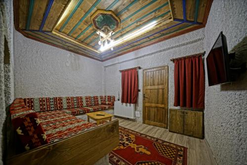 TV a/nebo společenská místnost v ubytování Cappa Cave Hotel