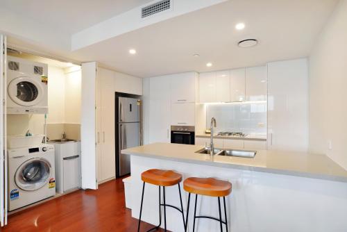 Η κουζίνα ή μικρή κουζίνα στο Atlas Apartments by CLLIX