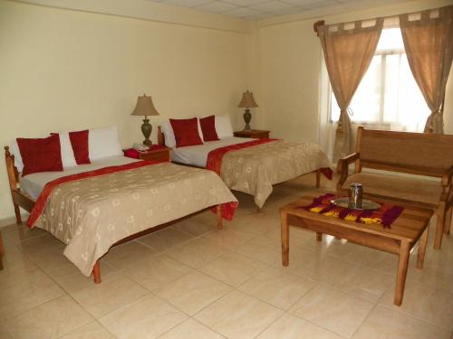 Una cama o camas en una habitación de Hotel Ipsan Nah