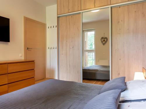 Postel nebo postele na pokoji v ubytování VacationClub – Bałtycka 10 Apartament 15